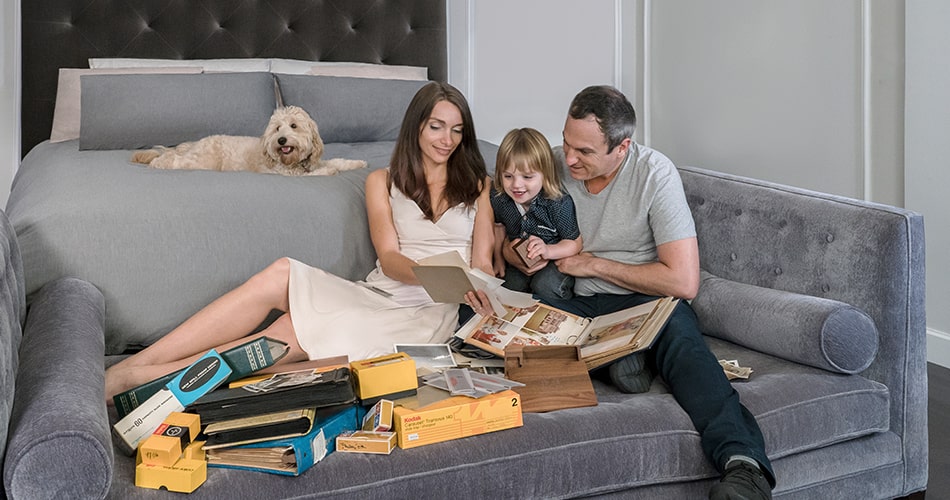 Family looking through photo albums