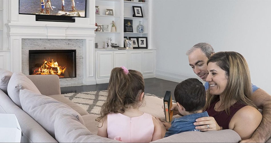 Family looking at old VHS tapes