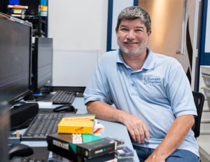An expert digitizing technician at Forever Studios