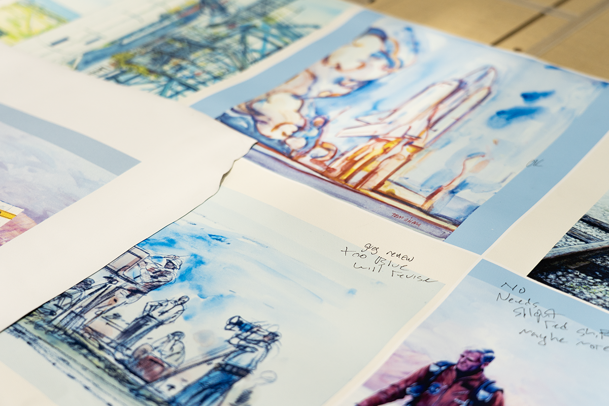 Large-format canvas print of restored NASA artwork during quality inspection